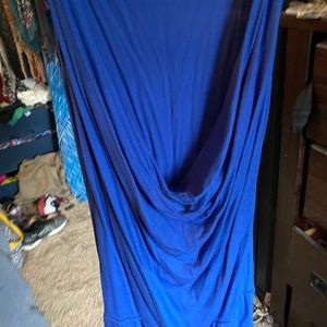 Beautiful royal blue tank top thanks very low in the front, the shirt is longer